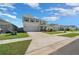 Charming two-story home featuring a well-manicured lawn, an attached two-car garage and inviting curb appeal at 4806 Sw 86Th Ln, Ocala, FL 34476