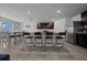 Eat-in kitchen features granite countertops, stainless steel appliances, breakfast bar, and tile floors at 4806 Sw 86Th Ln, Ocala, FL 34476