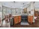 A spacious kitchen with stainless steel appliances, granite counters, and an adjoining dining area at 6577 Nw 193Rd St, Micanopy, FL 32667