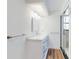Bathroom features a marble vanity, modern fixtures, and a walk-in shower at 7787 Nw 56Th Pl, Ocala, FL 34482