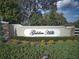 Golden Hills entrance sign surrounded by lush landscaping, marking the entrance to the prestigious community at 7787 Nw 56Th Pl, Ocala, FL 34482