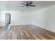 Spacious living room with hardwood floors and neutral-colored walls at 7787 Nw 56Th Pl, Ocala, FL 34482