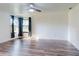 Large living room with hardwood floors and bright natural light at 7787 Nw 56Th Pl, Ocala, FL 34482