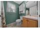 Cozy bathroom with vanity, mirror, medicine cabinet, toilet, and tile flooring at 882 Tanglewood Pl, The Villages, FL 32162