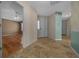 Inviting entryway with neutral paint and tile flooring at 882 Tanglewood Pl, The Villages, FL 32162