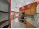 Well-equipped kitchen featuring stainless steel appliances and ample counter space at 882 Tanglewood Pl, The Villages, FL 32162