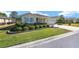Well-kept home with a green lawn, stone veneer, and an attached garage in a peaceful neighborhood at 9728 Sw 95Th Loop, Ocala, FL 34481