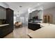 Well-lit kitchen with modern appliances, custom cabinetry, and a breakfast nook with natural light at 16751 Se 84Th Colerain Cir, The Villages, FL 32162