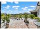 Well-maintained backyard featuring lush landscaping and a charming patio area, ideal for outdoor gatherings and relaxation at 10293 Sw 96Th Ln, Ocala, FL 34481