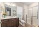 Bathroom featuring a shower, stylish vanity, and toilet at 10293 Sw 96Th Ln, Ocala, FL 34481
