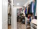 Walk-in closet featuring custom shelving and storage solutions at 10293 Sw 96Th Ln, Ocala, FL 34481