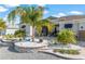 Inviting home with well-manicured landscaping, a paver walkway, and plenty of curb appeal at 10293 Sw 96Th Ln, Ocala, FL 34481