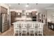 Spacious kitchen with a large island, stainless steel appliances, and modern cabinetry at 10293 Sw 96Th Ln, Ocala, FL 34481