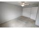 Spacious bedroom with carpet, ceiling fan, and large closet offers plenty of storage at 10315 Sw 62Nd Terrace Rd, Ocala, FL 34476