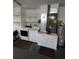 Convenient laundry area featuring washer, dryer, and water heater at 10315 Sw 62Nd Terrace Rd, Ocala, FL 34476