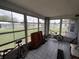 Sun room features windows, tile flooring and casual living space at 10315 Sw 62Nd Terrace Rd, Ocala, FL 34476