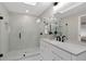 Modern bathroom featuring a glass shower, a vanity with granite countertop and dual lighting at 113 Weeping Elm Ln, Longwood, FL 32779