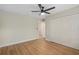 Empty room featuring laminated floors and a ceiling fan at 113 Weeping Elm Ln, Longwood, FL 32779