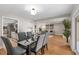 Open dining room with stylish furnishings, leading to the kitchen and living areas at 113 Weeping Elm Ln, Longwood, FL 32779