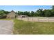 A well-maintained equestrian area with a white fence, ready for horse-related activities at 113 Weeping Elm Ln, Longwood, FL 32779