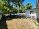 A partially shaded backyard includes air conditioning unit at 14646 Sw 43Rd Court Rd, Ocala, FL 34473