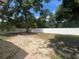 Large, partially shaded backyard has a privacy fence and mature trees at 14646 Sw 43Rd Court Rd, Ocala, FL 34473