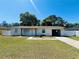 Charming single-story home with an attached garage and well-maintained front yard at 14646 Sw 43Rd Court Rd, Ocala, FL 34473