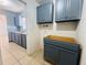 Kitchen area showcasing new cabinets, countertops, and tile flooring at 14646 Sw 43Rd Court Rd, Ocala, FL 34473