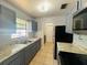 Well-equipped kitchen with sleek appliances, granite countertops, and ample cabinet space at 14646 Sw 43Rd Court Rd, Ocala, FL 34473