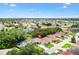 Expansive aerial view showcasing the neighborhood and well-maintained landscaping at 17536 Se 119Th Cir, Summerfield, FL 34491