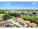 Elevated view of a home nestled in a neighborhood near a scenic golf course at 17536 Se 119Th Cir, Summerfield, FL 34491