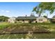 Expansive backyard featuring a lush lawn and well-maintained landscaping at 1866 Ne 39Th Ct, Ocala, FL 34470
