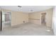 Neutral bedroom featuring wall to wall carpeting and access to other rooms at 1866 Ne 39Th Ct, Ocala, FL 34470
