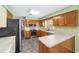 Kitchen with stainless steel appliances, lots of cabinet space, and tile flooring at 1866 Ne 39Th Ct, Ocala, FL 34470
