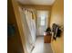 Bathroom featuring a shower with curtain, a door to the exterior, and towel racks at 1961 Sw 170Th Loop, Ocala, FL 34473