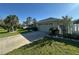 Exterior view of a home showing the driveway and a two car garage at 1961 Sw 170Th Loop, Ocala, FL 34473