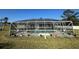 Screened in pool with an ample deck for entertaining at 1961 Sw 170Th Loop, Ocala, FL 34473