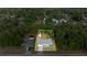 Aerial view of home, storage shed and pool surrounded by green trees at 2199 Se 175Th Ter, Silver Springs, FL 34488