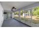 A covered lanai offers screened windows and backyard views at 2199 Se 175Th Ter, Silver Springs, FL 34488