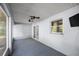 A covered lanai offers screened windows and backyard views at 2199 Se 175Th Ter, Silver Springs, FL 34488
