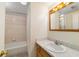 Cozy bathroom featuring a single vanity and shower-tub combination at 2300 Ne 49Th St, Ocala, FL 34479