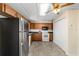An inviting kitchen featuring a full suite of appliances and tiled flooring at 2300 Ne 49Th St, Ocala, FL 34479