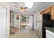 Cozy kitchen with stainless steel refrigerator and sliding glass doors to backyard at 2300 Ne 49Th St, Ocala, FL 34479