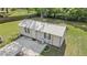 A functional outbuilding with double doors and concrete slab at 2300 Ne 49Th St, Ocala, FL 34479