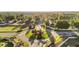 An aerial view of the community featuring well maintained landscaping and roundabout at 3011 Se 46Th Ave, Ocala, FL 34480