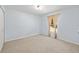 Bedroom showcasing natural light with carpeted floors and neutral walls at 3011 Se 46Th Ave, Ocala, FL 34480