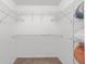 Walk-in closet with ample shelving and storage space at 3011 Se 46Th Ave, Ocala, FL 34480