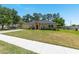 Charming single story home with well-manicured lawn and landscaped yard at 3011 Se 46Th Ave, Ocala, FL 34480