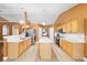 Bright kitchen with a center island, granite countertops, and stainless steel appliances at 3011 Se 46Th Ave, Ocala, FL 34480