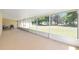 Screened patio with views of the lush backyard and trees at 3011 Se 46Th Ave, Ocala, FL 34480